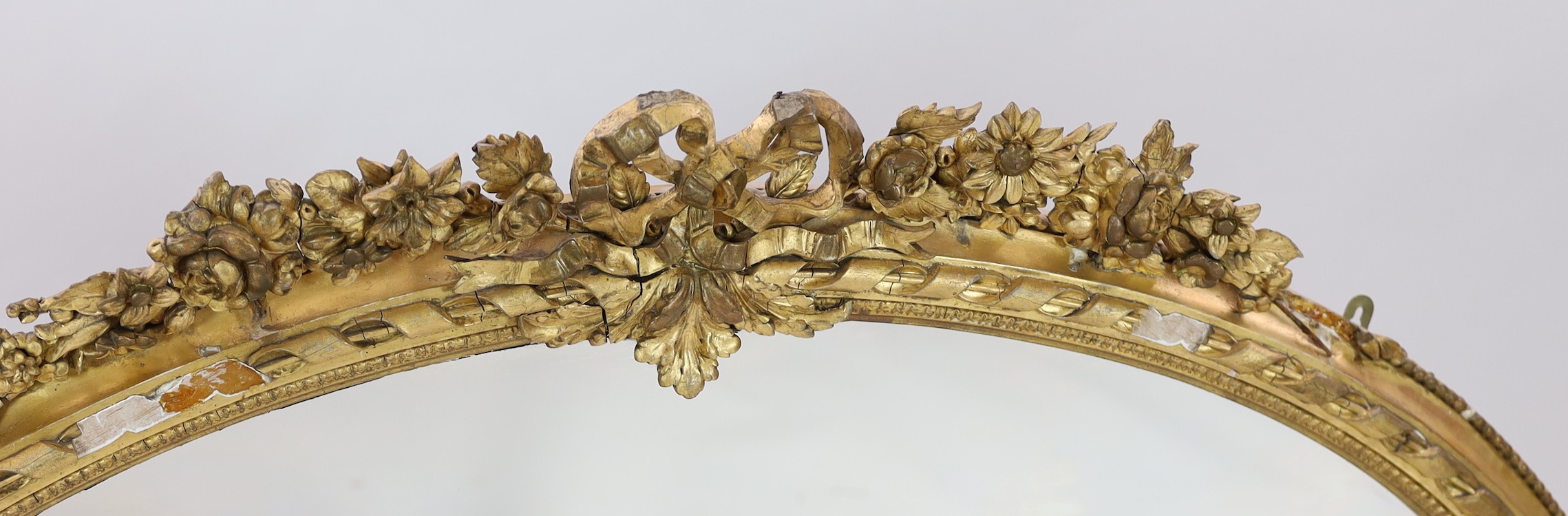 A Victorian giltwood and gesso overmantel mirror, width 176cm height 122cm